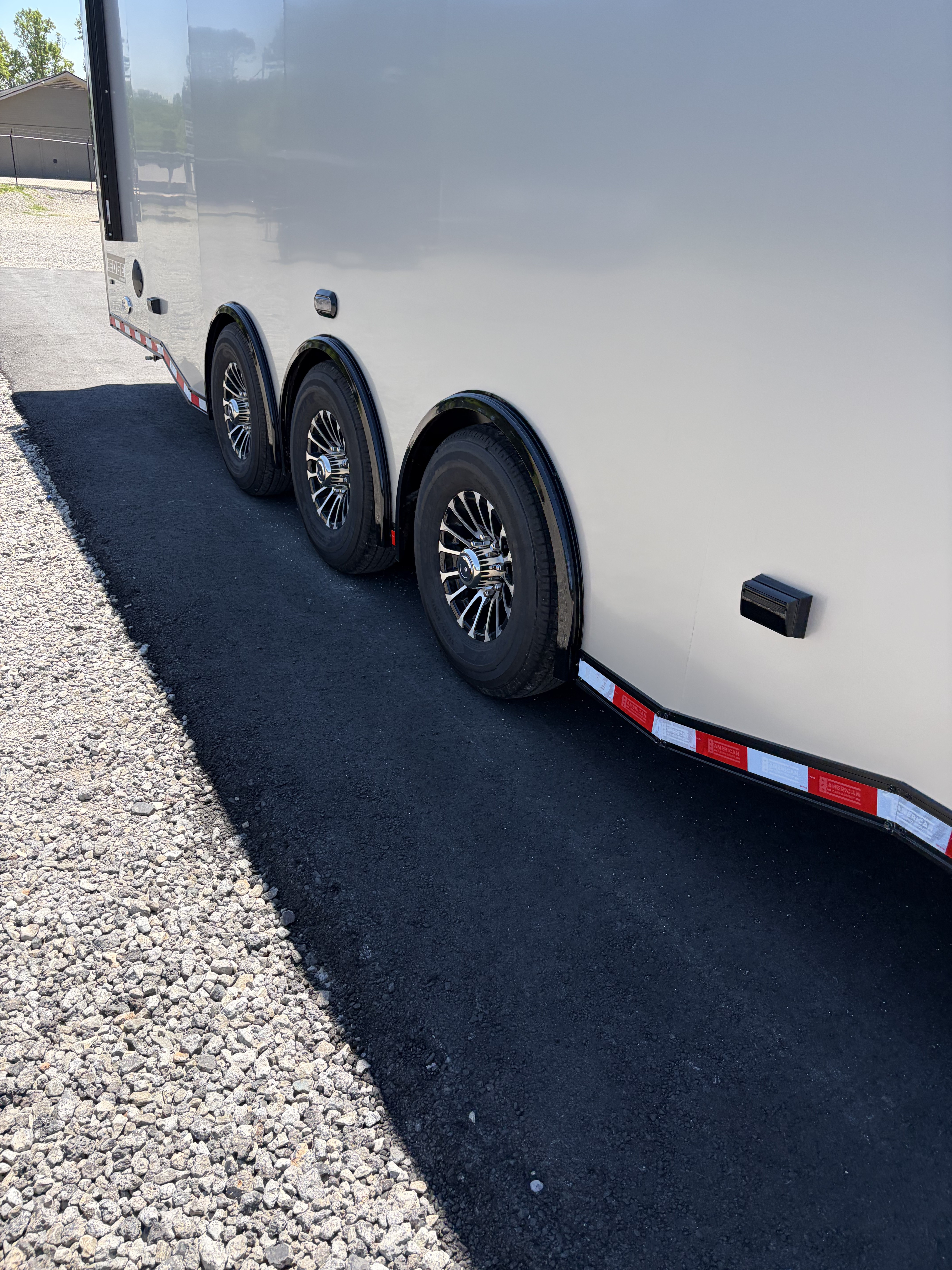 New 2026 Haulmark 34 Bathroom Race Trailer, Air Prep PKG, Awning, Polycor, Insulated, Window, 54" ALX Slide Out Step, A/C + Heat