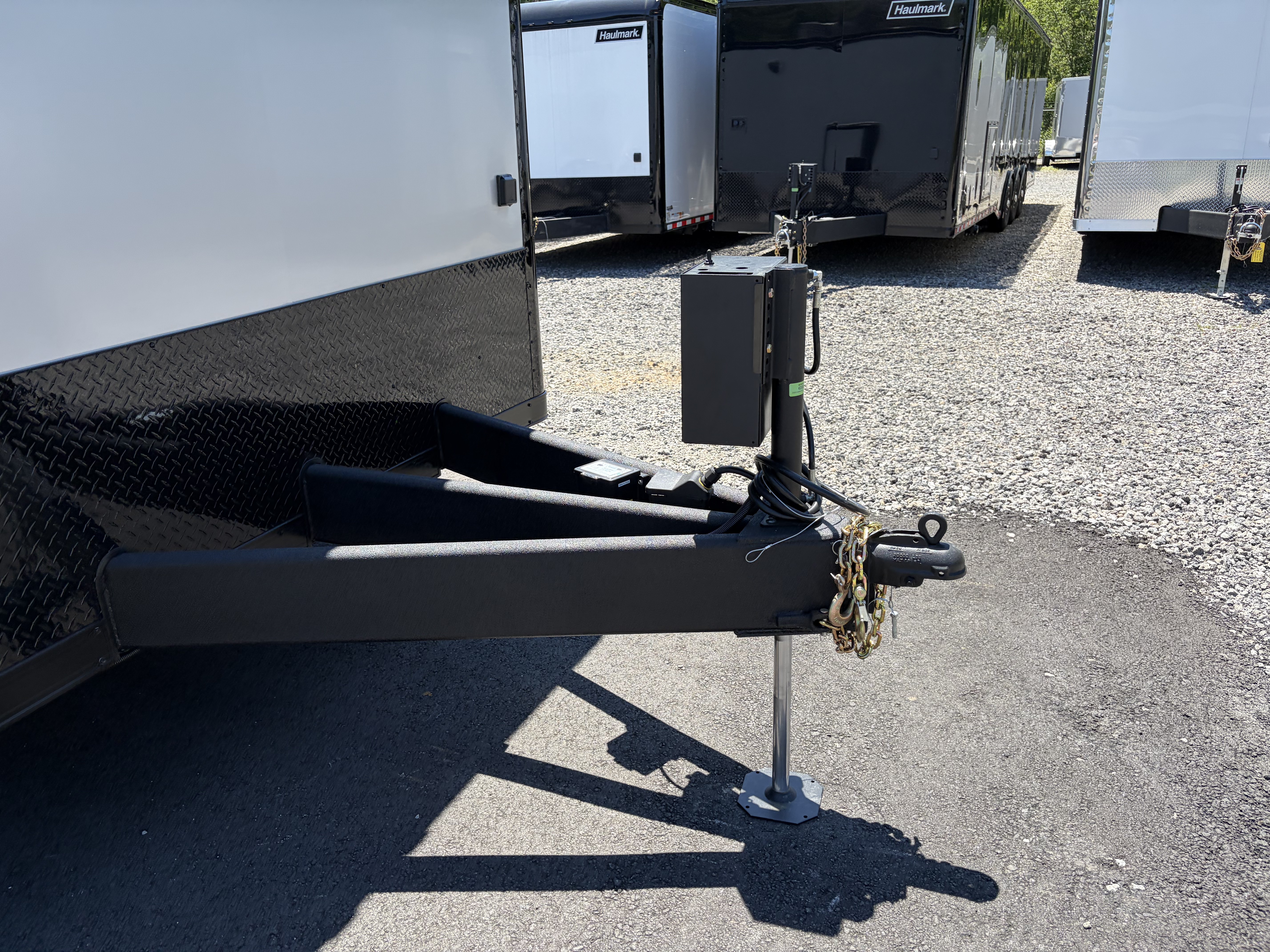 New 2026 Haulmark 34 Bathroom Race Trailer, Air Prep PKG, Awning, Polycor, Insulated, Window, 54" ALX Slide Out Step, A/C + Heat