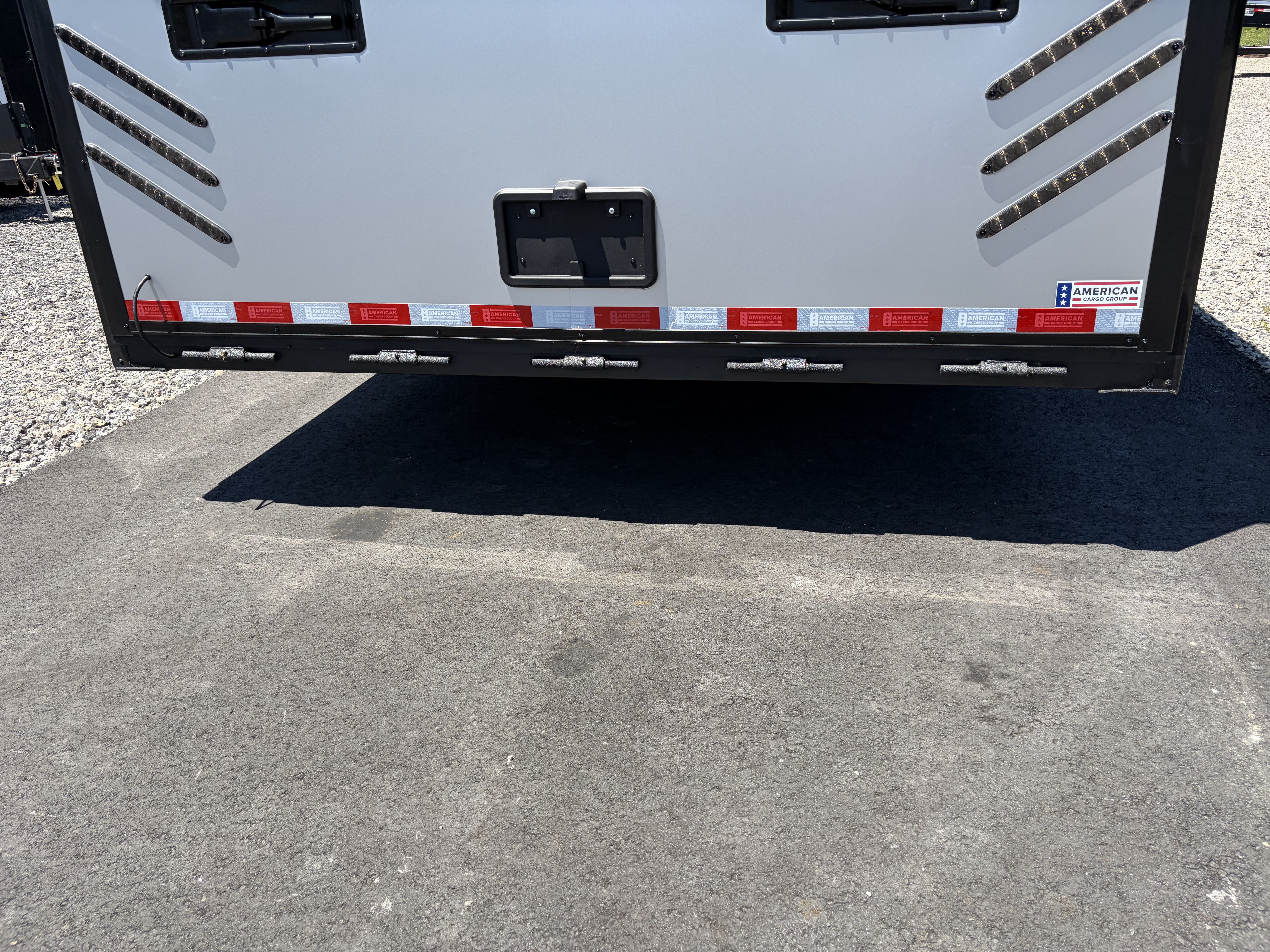 New 2026 Haulmark 34 Bathroom Race Trailer, Air Prep PKG, Awning, Polycor, Insulated, Window, 54" ALX Slide Out Step, A/C + Heat