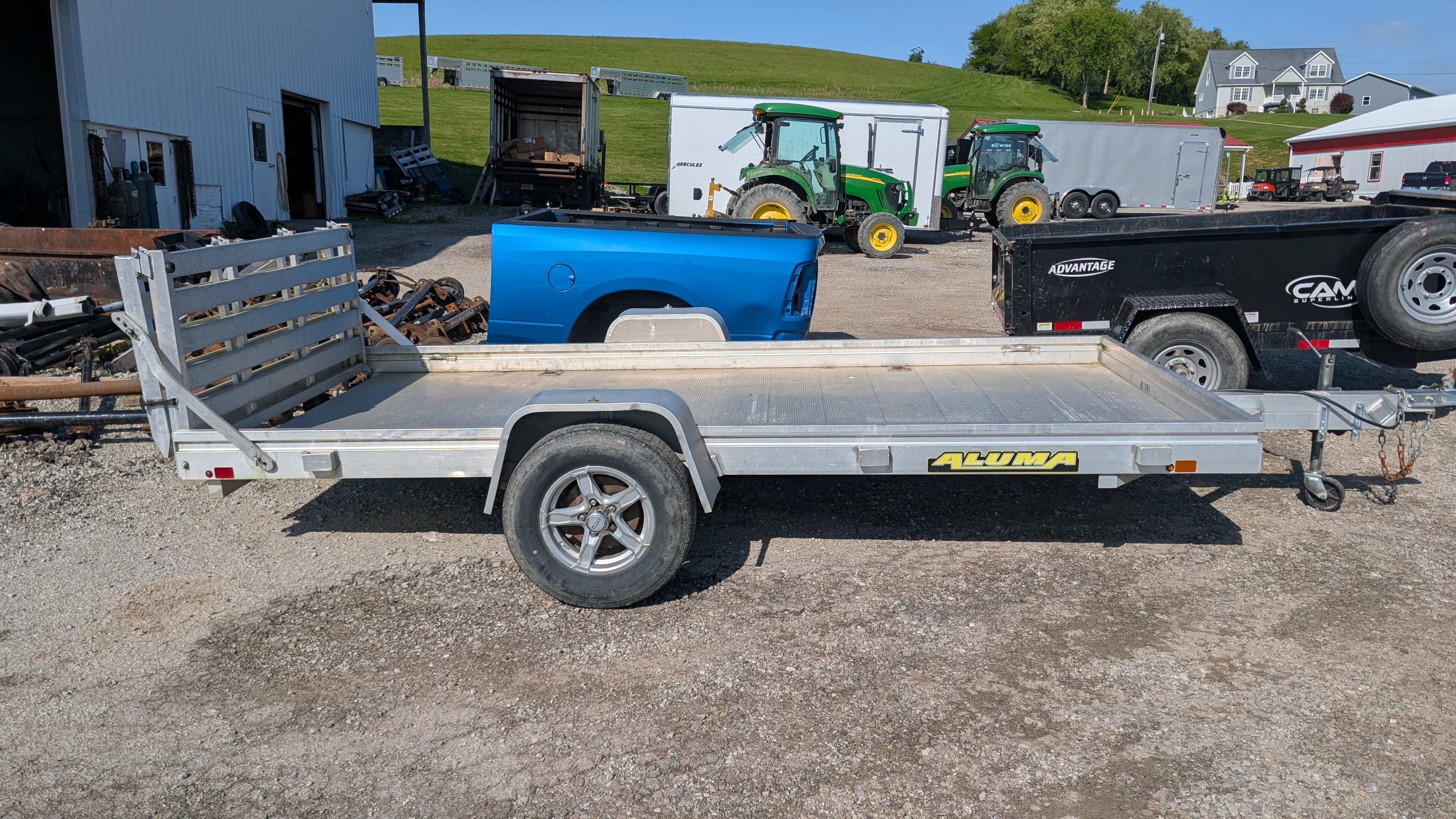 Used 2022 Aluma 5'8 x 12 HD Utility Trailer w/ Bi-Fold Gate